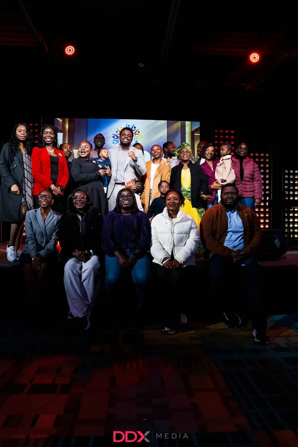 The Living Seed Church family on stage